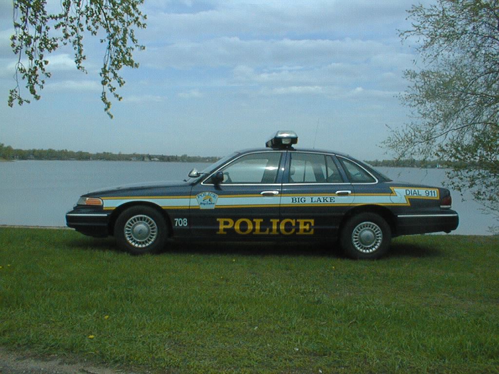 Police Car by a Lake